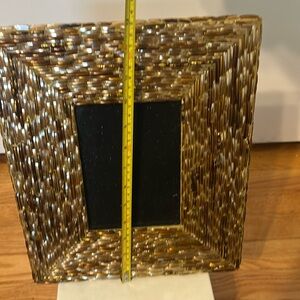 Pier 1 glass free standing photo frame. Unique, elegant design.